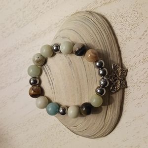Handmade Stretch Bracelet W/Butterfly Charm 7 1/2 ". Shades of Seafoam and Sand.